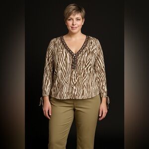 Two for…ex lg bead embellished animal print top with sz 16W tan capris. So cute!